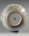 A Chinese famille rose 'peonies' bottle vase