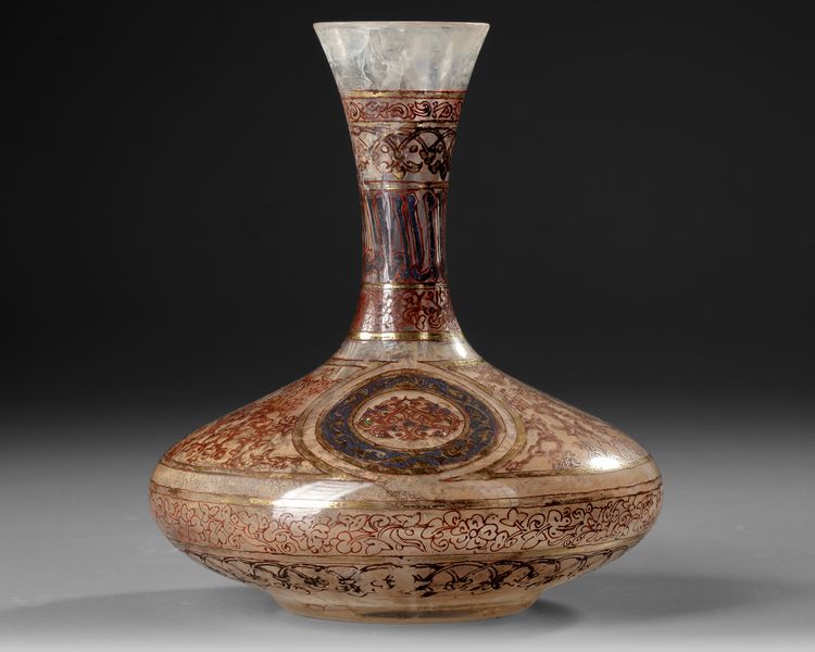 AN ISLAMIC GILDED AND ENAMELED BOTTLE VASE, 19TH CENTURY