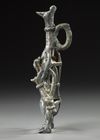 A WESTERN ASIATIC AMLASH OPENWORK BRONZE IDOL, CIRCA 1ST MILLENIUM B.C.