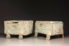 Two green-glazed pottery money boxes