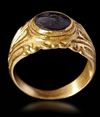 A ROMAN GOLD RING WITH DARK GREEN JASPER INTAGLIO, CIRCA 3RD-4TH CENTURY A.D.
