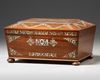 A WOODEN MOTHER-OF-PEARL INLAID BOX