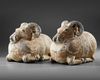 A PAIR OF TERRACOTTA VESSELS IN THE FORM OF A RAM, HAN DYNASTY (206 BC-220 AD)