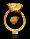 A GOLD INSCRIBED SEAL RING