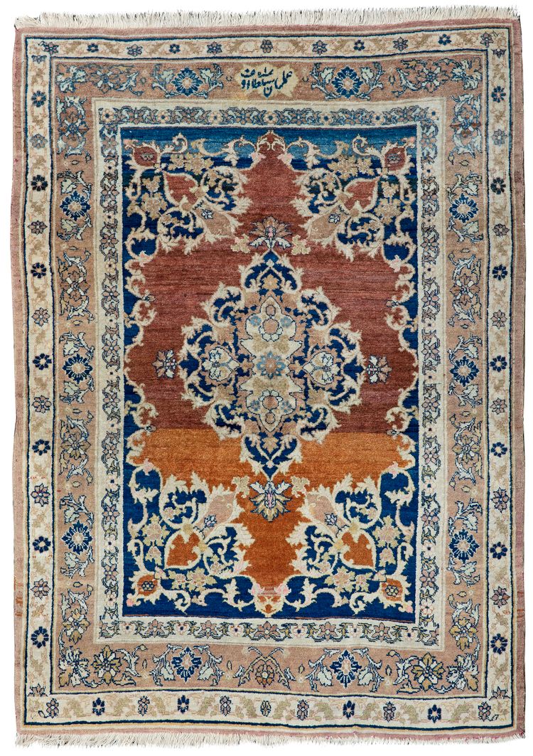 A SIGNED TEBRIZ HAJI JELILI CARPET, 1920