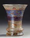 AN ISLAMIC ENAMELLED GLASS BEAKER, 19TH CENTURY