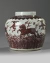 A Chinese underglaze copper-red-decorated 'sea horses' jarlet
