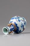 A famille rose blue and white miniature vase