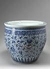 A large Chinese blue and white 'lotus' fish bowl