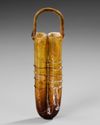 A DOUBLE-TUBE GLASS UNGUENTARIUM WITH APPLIED HANDLE, CIRCA 4TH-5TH CENTURY AD