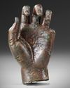 A ROMAN BRONZE FEMALE LEFT HAND, CIRCA 1ST CENTURY AD