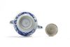A large Chinese blue and white 'birds and flowers' teapot and cover