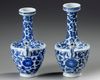 A PAIR OF BLUE AND WHITE EWERS, KANGXI PERIOD (1662-1722 )