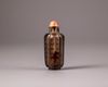 A Chinese smokey-quartz hexagonal inscribed snuff bottle