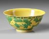 A CHINESE YELLOW-GROUND GREEN GLAZED 'BOYS' BOWL, 19TH-20TH CENTURY