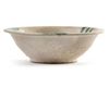 AN ABBASID TIN GLAZED POTTERY BOWL, MESOPOTAMIA, 9TH CENTURY