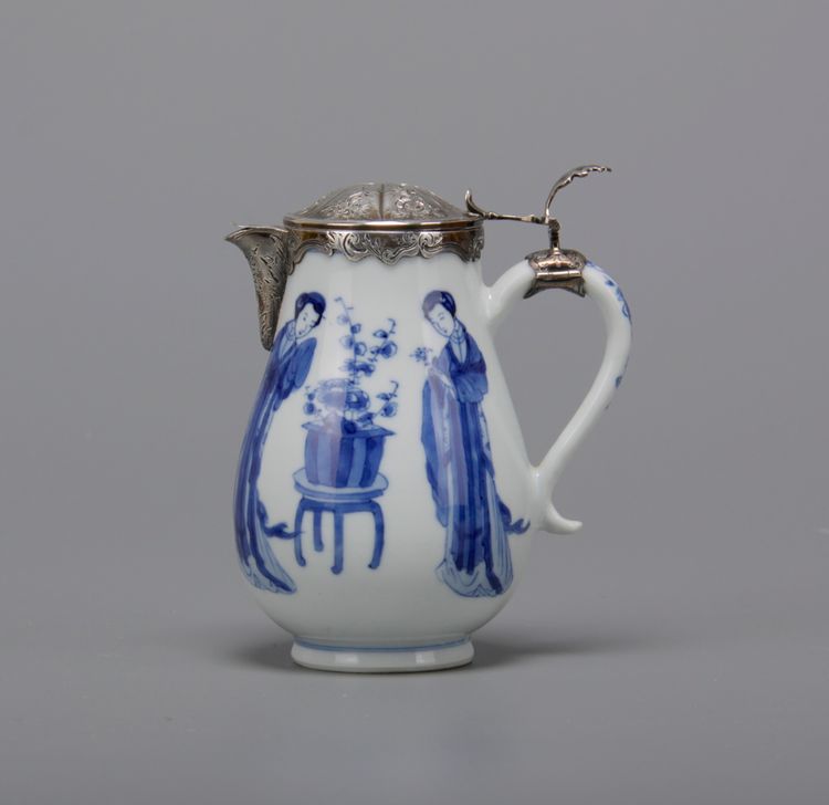 A blue and white milk jug