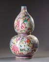 A Chinese famille rose 'millefleurs' double gourd vase