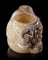 A CHINESE JADE JAR OF A WINGED MAN, WESTERN HAN DYNASTY  (206 BC–9 AD)
