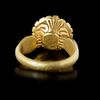 A BYZANTINE GOLD RING SET WITH A GARNET INTAGLIO, 6TH CENTURY AD OR LATER