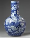 A Chinese dragon blue ground bottle vase