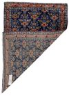 A FINE ANTIQUE PERSIAN SENNEH RUG