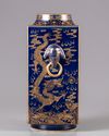 A gilt blue-ground cong vase