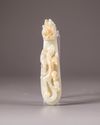 A Chinese pale celadon jade 'dragon and chilong' belt hook