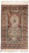 AN EXTREMELY FINE SILK HEREKE RUG, 20TH CENTURY