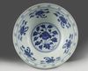 A rare Chinese blue and white 'lotus scroll' bowl