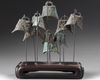 A set of nine Chinese bronze carriage bells