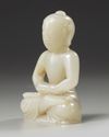 A Chinese white jade Shakyamuni