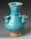 A KASHAN TURQUOISE GLAZED POTTERY VASE, PERSIA, 13TH CENTURY