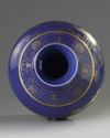 A Chinese blue-ground gilt decorated 'Three Friends of Winter' bottle vase