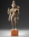 A  GILT BRONZE STATUE, NEPAL, 17TH-18TH CENTURY