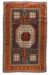 A KARACHOF KAZAK RUG WITH GREEN BACKGROUND