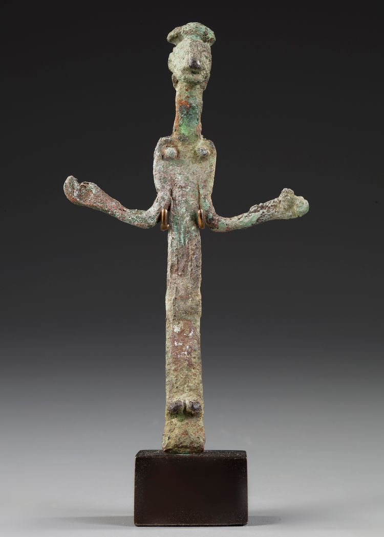 A WESTERN ASIATIC BRONZE FEMALE FIGURE, CIRCA EARLY 2ND MILLENIUM B.C.