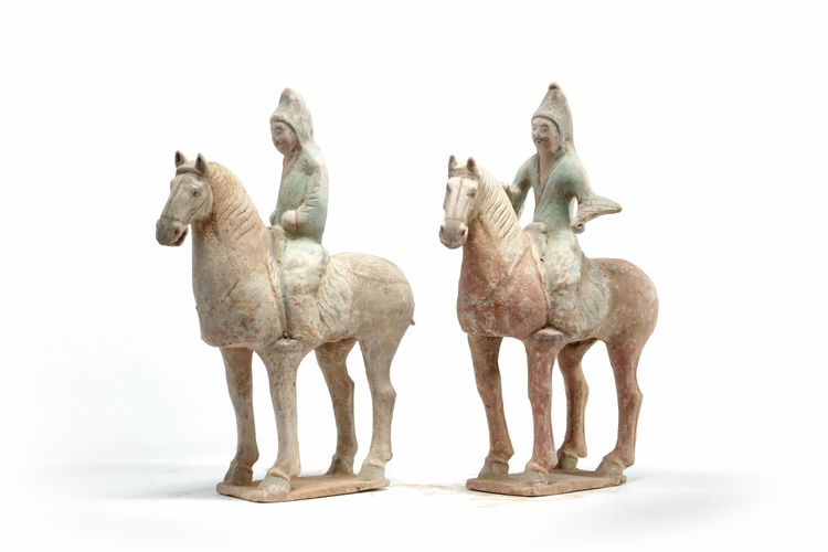 A pair of Chinese pottery equestrians