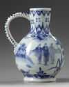 A JAPANESE BLUE AND WHITE JUG, 17TH CENTURY