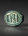 A GROUP OF EGYPTIAN GLAZED COMPOSITION SCARAB SEALS WITH HIEROGLYPHIC MOTIF, MIDDLE TO LATE KINGDOM, CIRCA 2133-525 B.C.