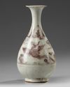 A Chinese Ming-style underglaze copper red 'phoenix' pear-shaped vase, yuhuchunping