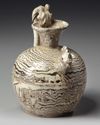A Chinese marbled chicken head ewer