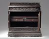 A small Chinese carved zitan cabinet