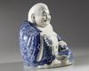 A Chinese blue and white figure of Budai