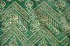 AN OTTOMAN GREEN KISWA TEXTILE FRAGMENT,  TURKEY OR EGYPT, 20TH CENTURY