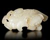 A CREAMY WHITE 'RUI SHOU' AUSPICIOUS BEAST, CHINA, HAN DYNASTY (206 BC-220 AD)