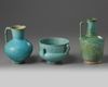Two Islamic turquoise glazed jugs and a bowl
