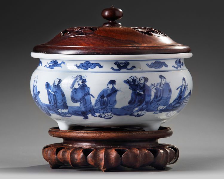 A Chinese blue and white 'Eight Immortals' tripod censer