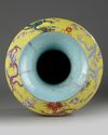 A Chinese yellow-ground famille rose 'nine dragon' vase, hu