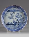 A JAPANESE BLUE AND WHITE BARBED-RIM DISH, 18TH CENTURY